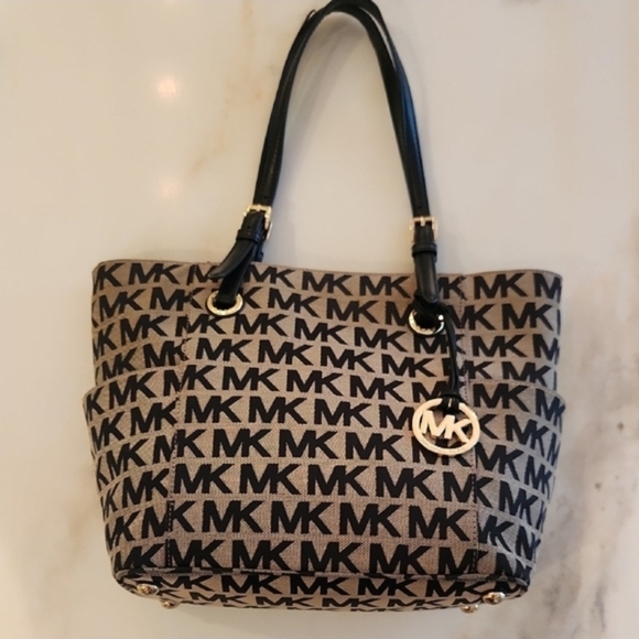 Michael Kors Handbags - Michael Kors Signature Black and Tan Tote
